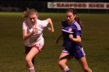 Brianna Navarrete keeps her eyes on the ball in Wednesday game against Hanford.